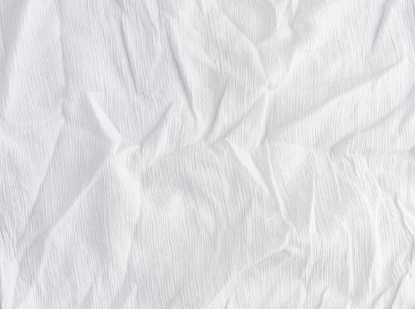 Zmačkaná bílá bavlněná tkanina, tkanina pro šití oděvů a šití — Stock fotografie