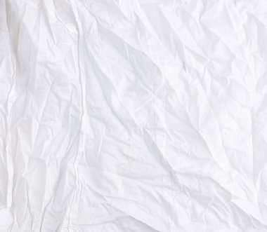 Buruşmuş beyaz pamuk kumaş, elbise dikmek için kumaş.