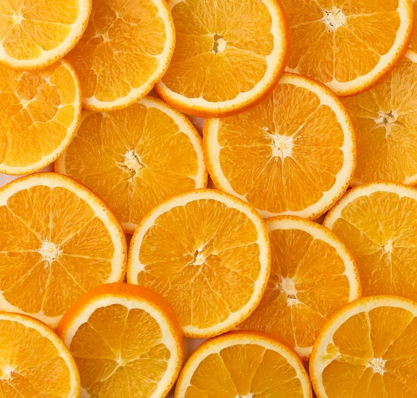 Textura de rodajas redondas de naranja jugosa madura. Marco alimenticio ecológico —  Fotos de Stock