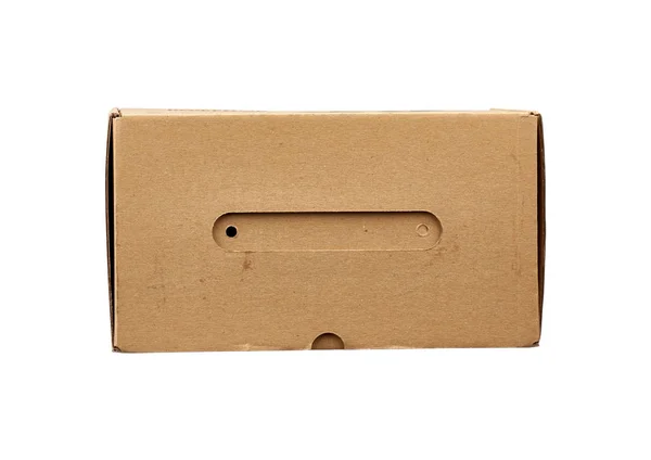 Closed brown rectangular cardboard box for transporting goods — 스톡 사진