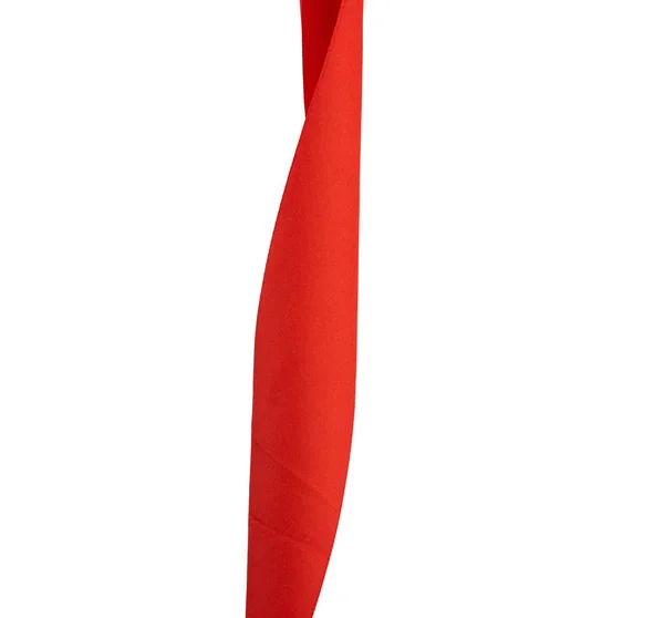 Gedrehtes Dekorband aus roter Seide zum Verpacken von Geschenken auf einem weißen — Stockfoto