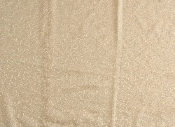 Beige satin textile fabric with embroidery elements, piece of ca — 스톡 사진