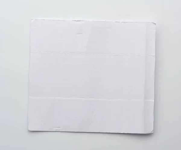 White blank corrugated paper sheet on white background — 스톡 사진