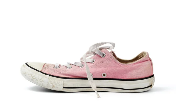 Een Licht Roze Versleten Textiel Sneaker Met Veters Geïsoleerd Een — Stockfoto