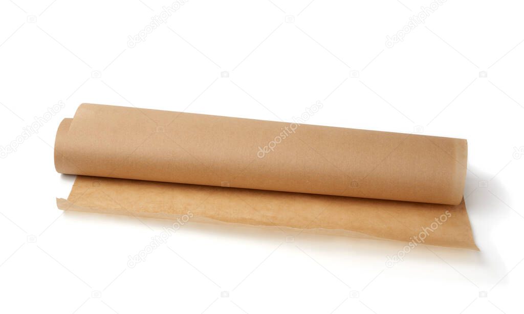 twisted roll of brown parchment paper isolated on a white background, wax baking paper