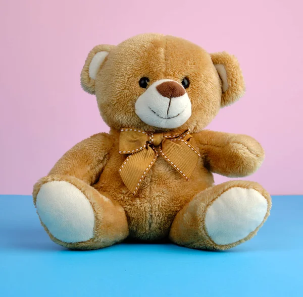 Cute Little Brown Teddy Bear Toy Sitting Blue Background Close — Stock Photo, Image