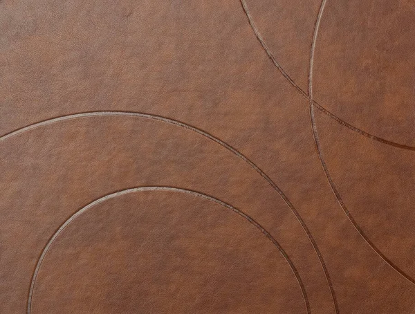 エンボス加工が施された茶色の革の表面の質感 フルフレーム クローズアップ — ストック写真