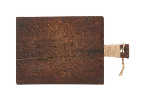 very old brown rectangular wooden kitchen cutting board with handle, utensils isolated on a white background