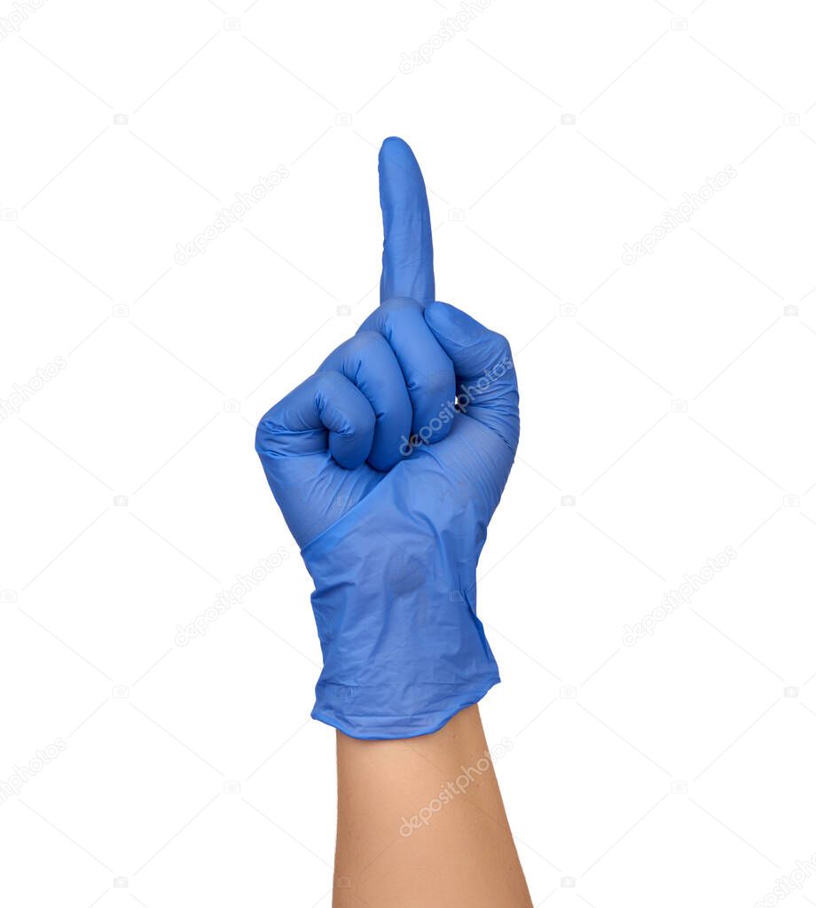 female hand in a blue medical sterile glove shows a gesture, the index finger is raised up, part of the body is isolated on a white background, attention concept