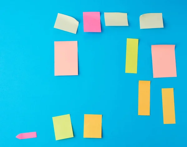 Pegatinas Papel Multicolor Diferentes Formas Sobre Fondo Azul Telón Fondo — Foto de Stock