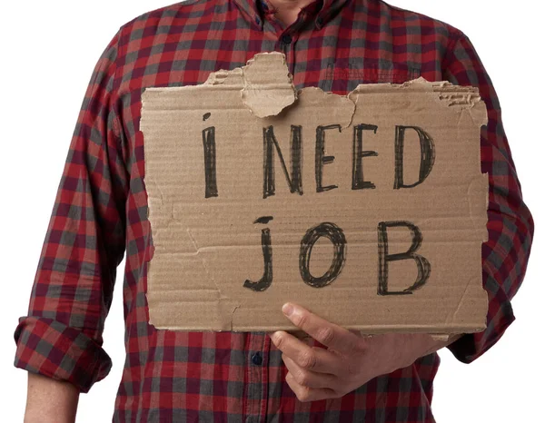 Man Plaid Shirt Jeans Holds Piece Paper Inscription Need Job — Stock Photo, Image