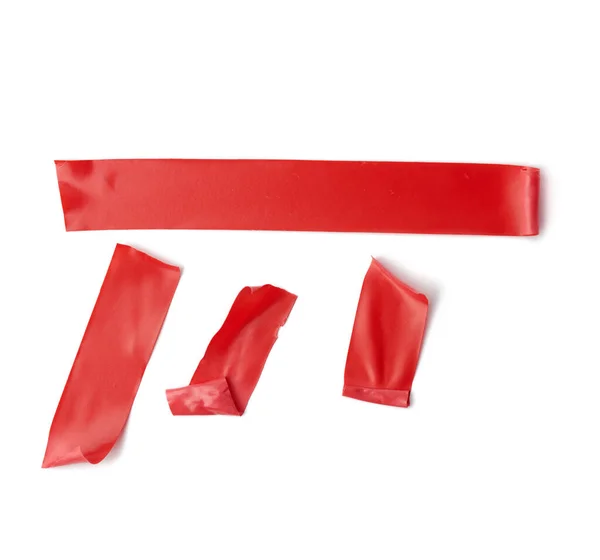 Diverse Stukjes Rood Isolerend Rubber Tape Geïsoleerd Een Witte Achtergrond — Stockfoto