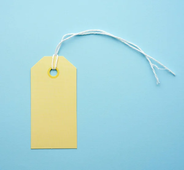 Empty Yellow Paper Tag Tied White String Price Gift Sale Royalty Free Stock Images