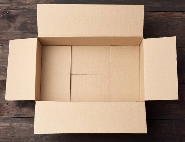 Open Empty Brown Rectangular Cardboard Box Transporting Goods Brown Wooden — Stock Photo, Image