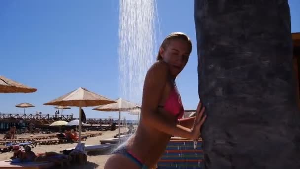 Young Sexy Woman Under Shower at the Summer Beach — Stockvideo