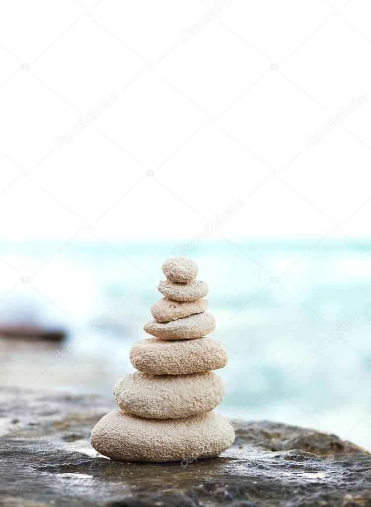 Zen stones, background the ocean for the perfect meditation