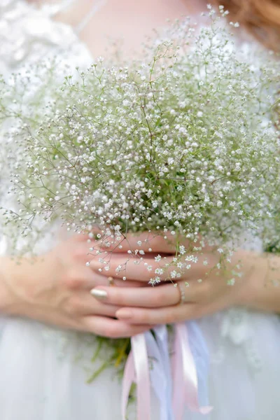 wedding bouquet in hands