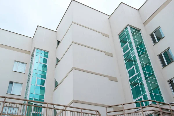 hospital building facade with blue windows
