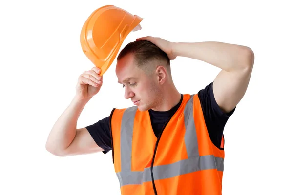 Builder arbetare i orange protectiive cask isolerad på vit — Stockfoto
