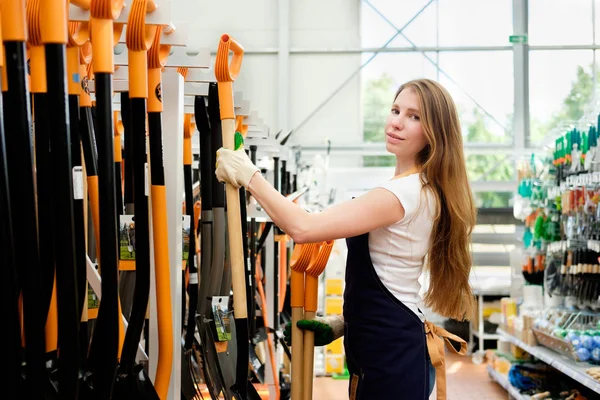 Seller in building equipment tools store at work — Stock Photo, Image
