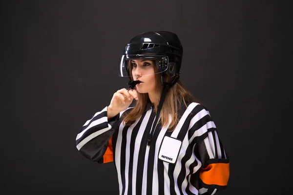 Ice hockey referee-woman  on black background — Stock Photo, Image
