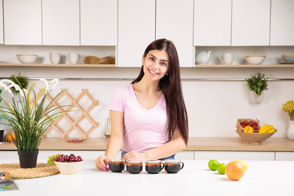 Attractive woman offering tea