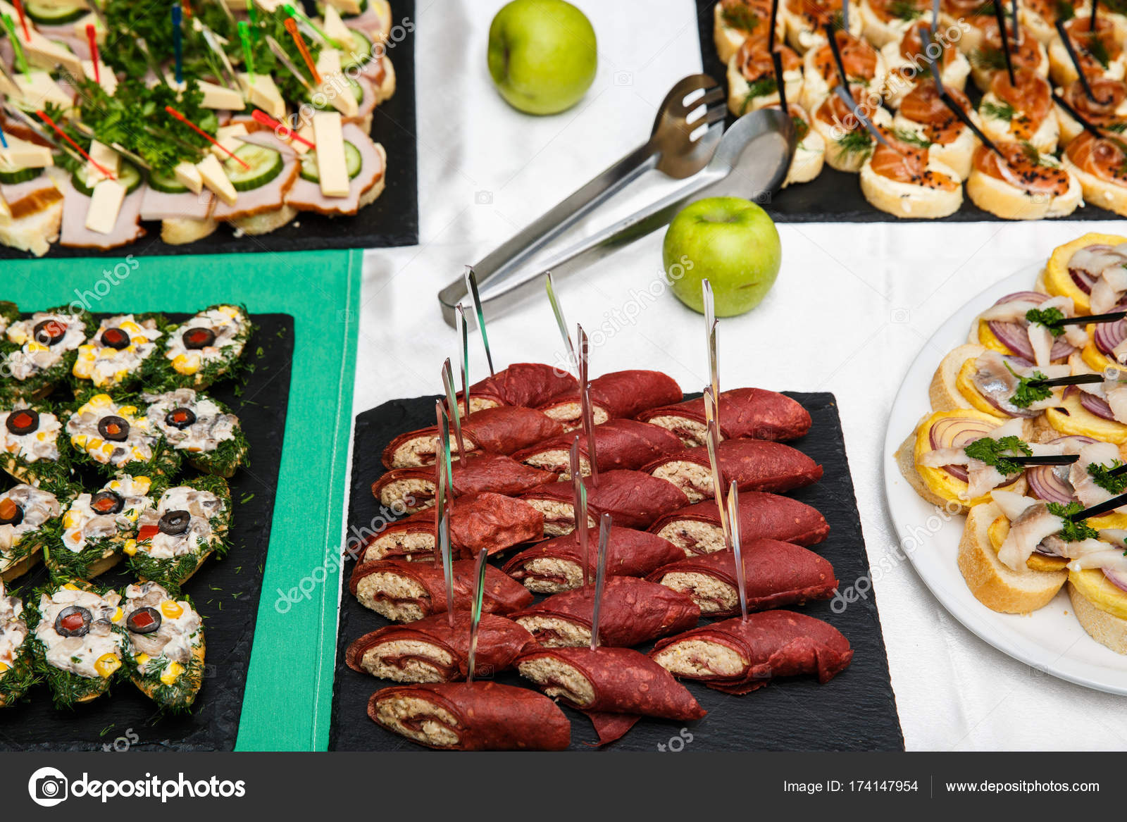 beautifully decorated catering banquet table with different food