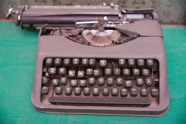 Uma máquina de escrever antiga. Vintage máquina de escrever Closeup foto. — Fotografia de Stock