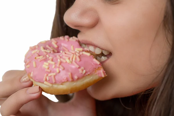 Beautiful sensual woman, eating a donut