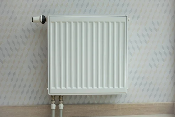 White radiator in an apartment. home heating