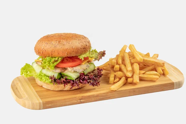 Traditional hamburger and french fries . Isolated on white background — Stock Photo, Image