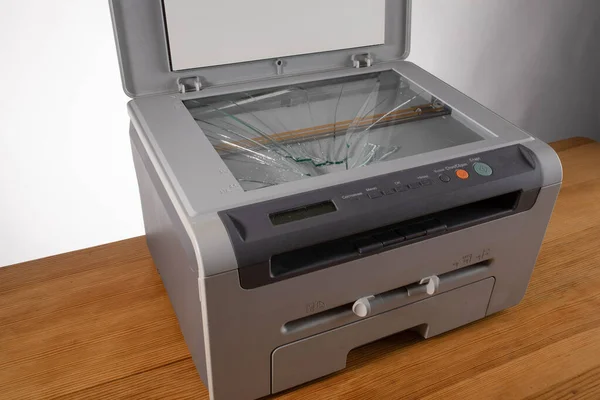 the Broken old office printer and scanner