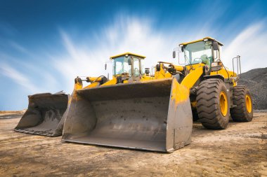 bir inşaat alanı üzerinde buldozer