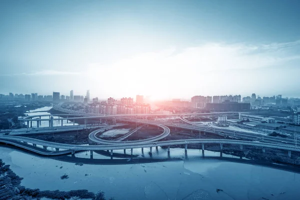 city highway interchange in shanghai on traffic rush hour