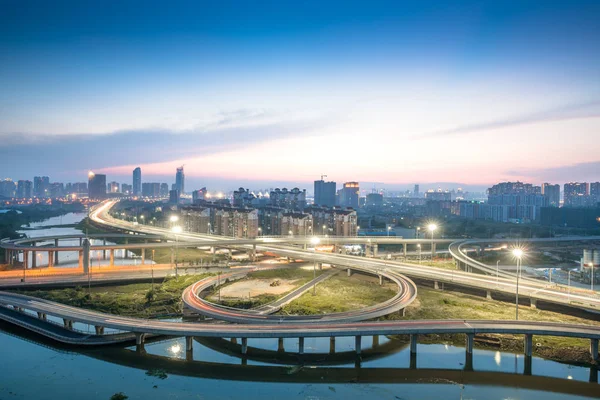 city highway interchange in shanghai on traffic rush hour