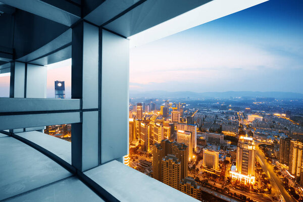 A bird's eye view of the city night view outside the window