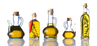 Bottles of Cooking Oils on White Background clipart