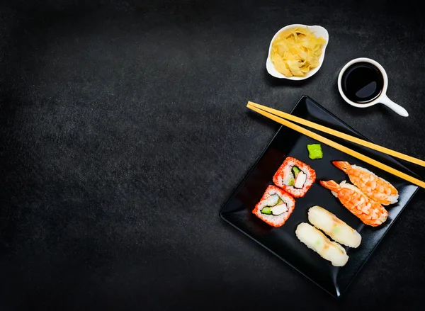 Sushi on Dark Plate with Copy Space — Stockfoto