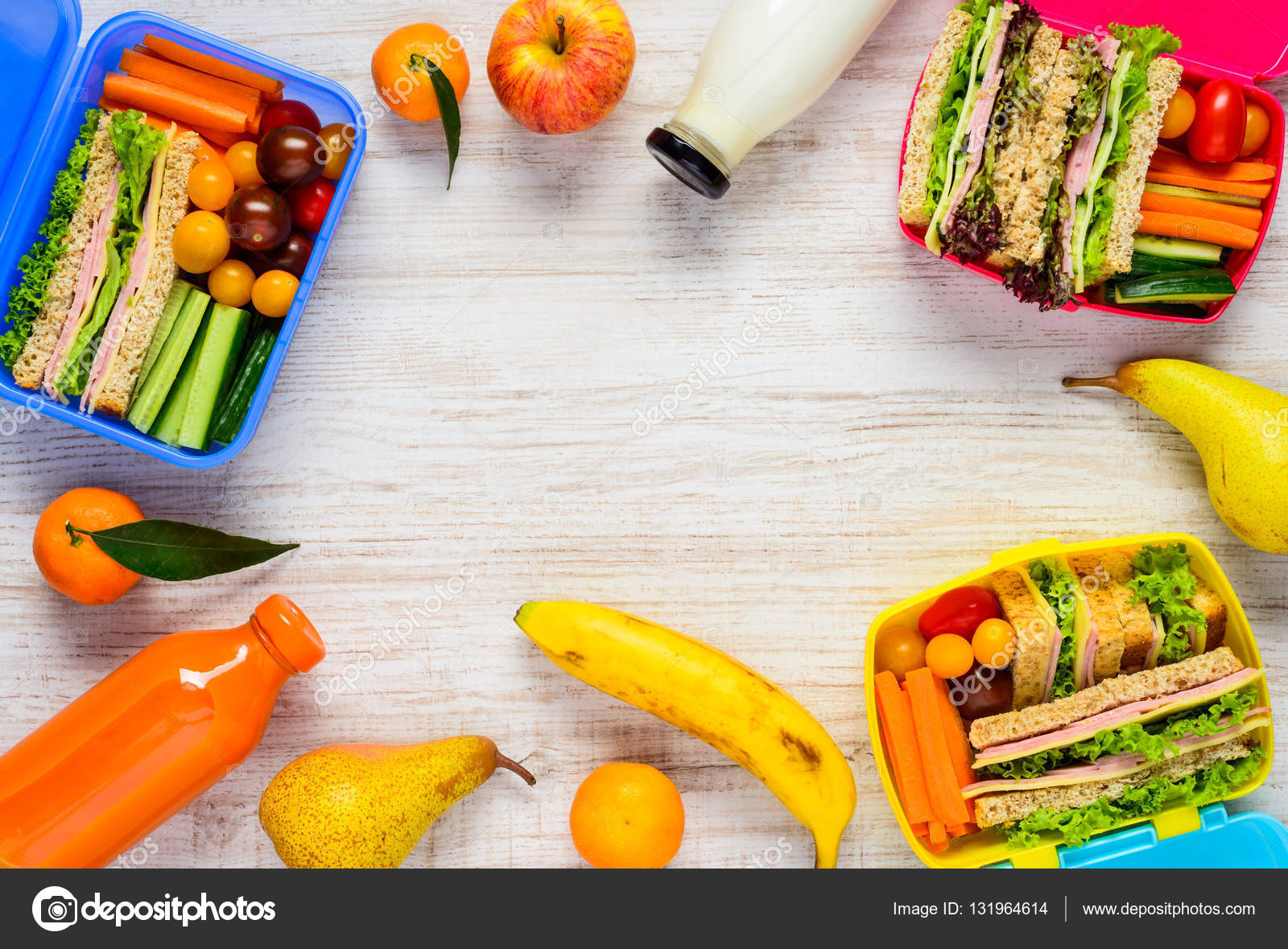 Lunch Boxes with Fruits and Copy Space Frame Stock Photo by 131964614