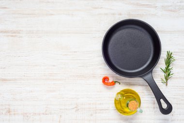 Frying Pan with Olive Oil and Copy Space clipart
