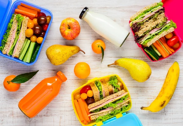 Lunch Boxes with Fruits and Drinks — Stock Photo, Image