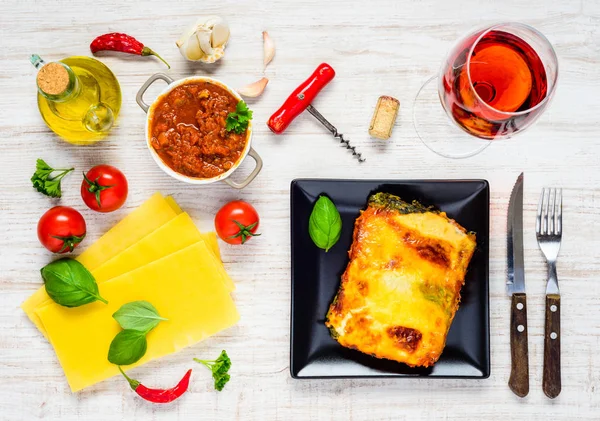 Lasanga Pasta Served on Plate and Cooking Ingredients — Stock Photo, Image