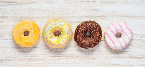 Donuts Postres Comida en Top View —  Fotos de Stock