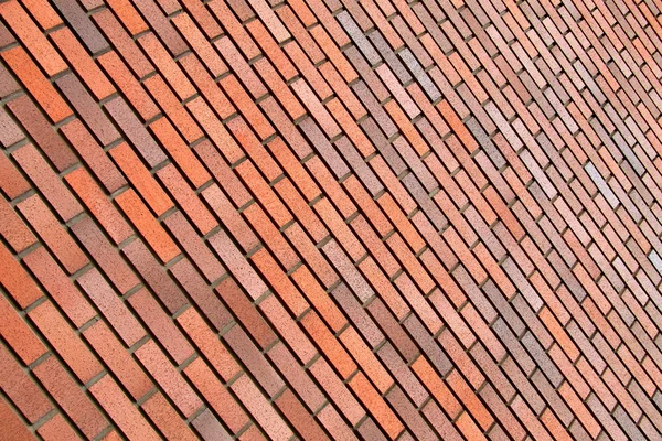 Röd tegelvägg, bakgrund, diagonal position, sten textur, — Stockfoto