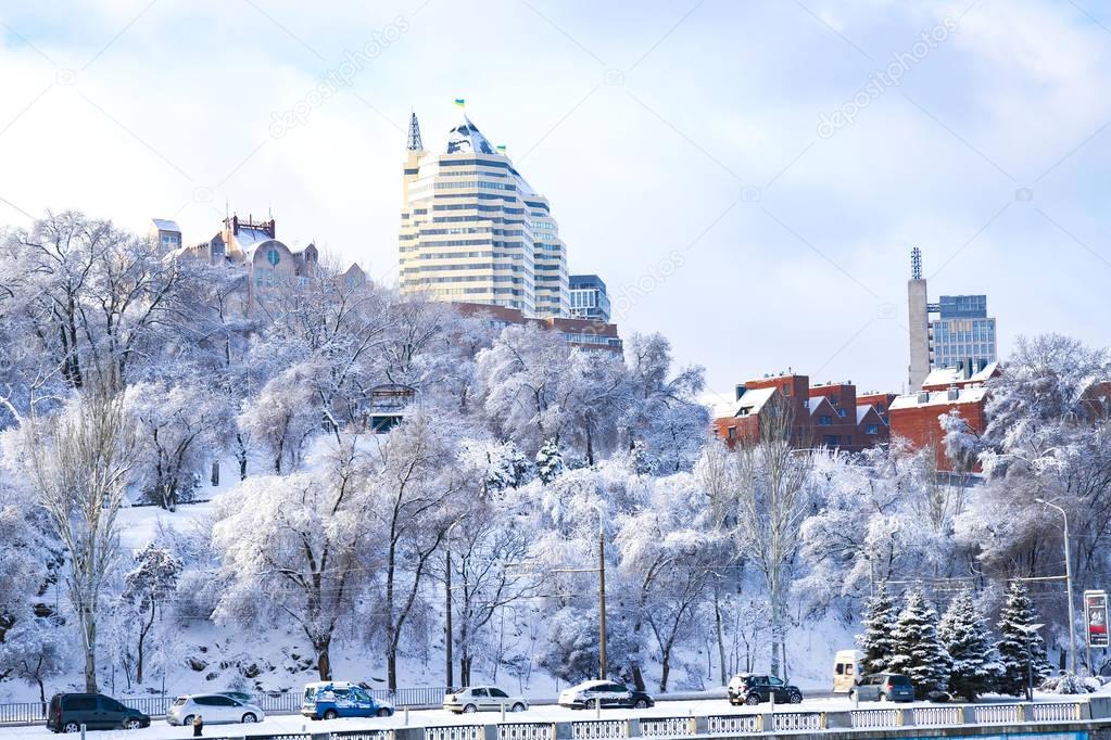 Winter landscape of the Dnepr, covered with snow and hoarfrost. View of the buildings  skyscrapers  and park  from the Monastery Island. Ukraine (Dnepropetrovsk, Dnipro,  Dnipropetrovsk) 
