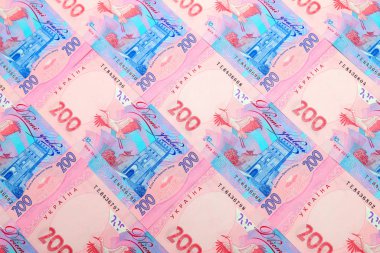 Ukrayna Hryvnia 'sı, 200 Hrivna' yı satranç tahtası şeklinde, köşegen şeklinde banknotlar. Para konsepti ve geçmiş, tatiller için hediyeler, kredi, alışveriş, kredi, depozito. Ukrayna onisi 