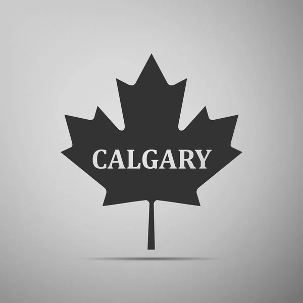 加拿大的枫叶，与城市名称卡尔加里平面图标在灰色的背景上。矢量图 — 图库矢量图片