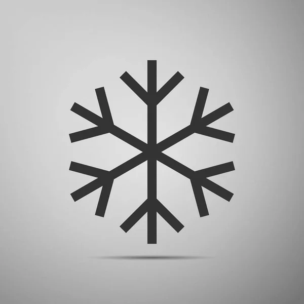 Icono plano de copo de nieve sobre fondo gris. Ilustración vectorial — Vector de stock