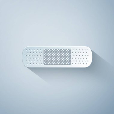 Kağıt kesilmiş Bandaj alçı simgesi gri arka plan üzerinde izole. Tıbbi alçı, yapışkan bandaj, esnek kumaş bandajı. Kağıt sanat tarzı. Vektör İllüstrasyonu