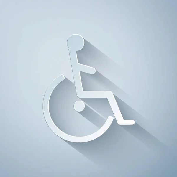 Corte de papel Ícone de handicap desativado isolado em fundo cinza. Sinal de deficiente em cadeira de rodas. Estilo de arte de papel. Ilustração vetorial — Vetor de Stock